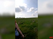 Busty redhead mature shows off her big boobs while out on a hike 14/16