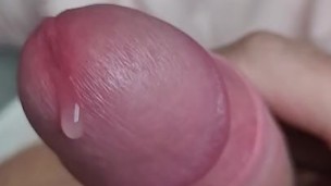 Sorting out morning erection jerking on bed cum on stomach