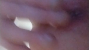 Playing with anal toy