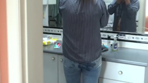 I found my stepson jerking off and I let him cum on my ass with my jeans on