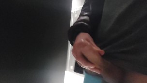 Horny teen bisexual boy stroking his dick and shooting a lot of cum in public male restroom