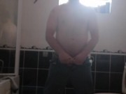 LongJohn0Hara wanking in the bathroom with his jeans on