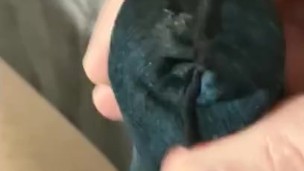 Jerking thru elephant pants with cumshot