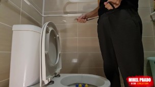 Boy pissing in the sink