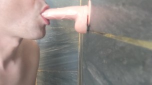 Sucking and gagging on big juicy cock dildo