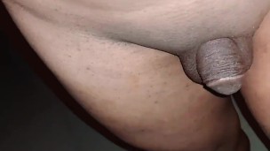 Tiny limp dick ladyboy nude walking out and pissing