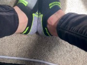 Two socked feet rub against one another - SFW 14/16