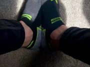 Two socked feet rub against one another - SFW 15/16