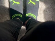 Two socked feet rub against one another - SFW 5/16