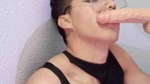 Young Sissy Sucks Dildo On The Internet.
