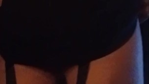 Crossdressing locked in chastity with buttplug in