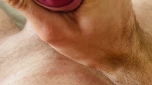 Young man with red fingernails with hard dick and strokes it until he cums
