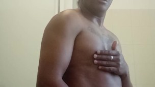 Masturbating