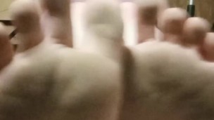 Dirty barefeet feet, and wiggle toes