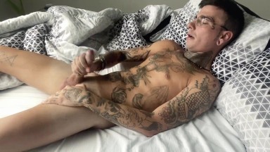 Hot tattooed guy shots own cum into mouth