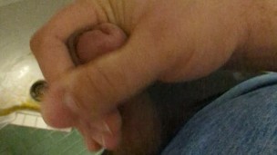 Risky Wank: horny hung bear jerks in a public university restroom, leaves sticky cum