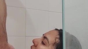 I suck my neighbor's cock in the shower until he cums in my face
