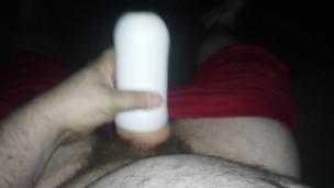 Some playful stroking with hand and toy