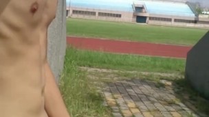Stadium naked waiting for exercisers to pass by