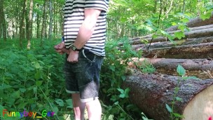 Relaxed emo guy pissing and jerks off in a forest and squirts his cum