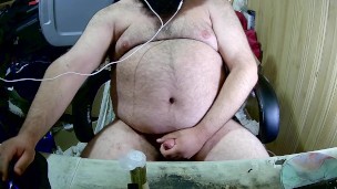 Big Bear Jerks off watching porn