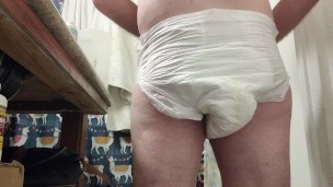 Diaper boy inserts Tampax Pearl Super Tampon in ass
