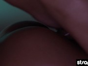 Sexy girl is oiled up and fucked with a slick strap on cock 15/16