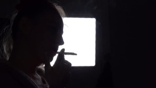Shadow play while I light a cigarette. Alternative video, by long blonde hair girl