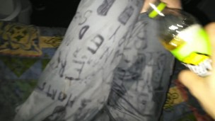 emptying bottle of piss on under armour clothes