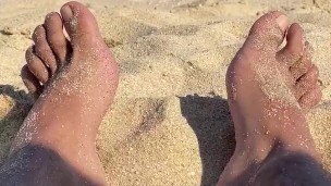 big feet on the sand