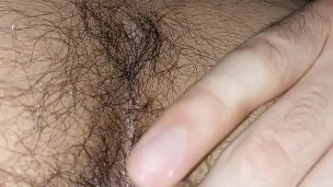 Spreading hairy ass and masturbating