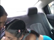 Lesbian girlfriends eat each other in the uber on the way to the gym