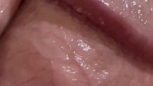 Cock in close up, look at it closely how it shines from how hard and wet it is