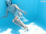 Petite teen Ivi Rein endures the free naked swimming 10/16