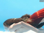 Petite teen Ivi Rein endures the free naked swimming 9/16