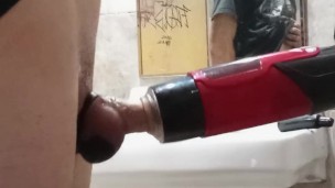 In the public laundromat using my automatic masturbator
