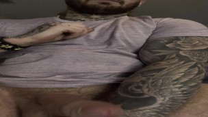 College guy stroking his big dick with shirt on his spare time