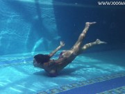 Heidi submerges herself in to the hot pool 1/16