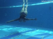 Heidi submerges herself in to the hot pool 3/16