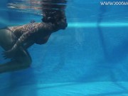 Heidi submerges herself in to the hot pool 7/16