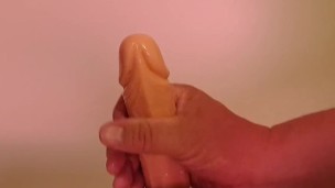 Handjob with babyoil for Dildo
