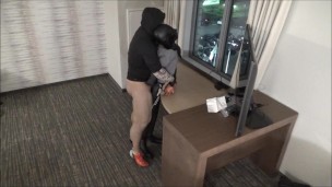 muscular silicone masked man humping dummy at hotel window