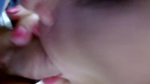 Annick licks and sucks in the office