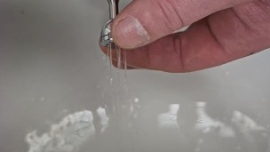 Piss hole sounding with a sprinkler rod