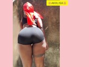 Tiktoker AKIILISA outdoors in black booty short