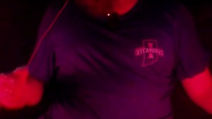 Masturbating illuminated by a deep red light