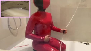 4 liters Enema in PVC catsuit and latex inflatable mask