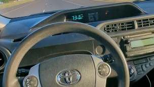 Hung bear jerks off in car driving down the freeway. Massive cumshot
