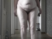 Fully naked mature BBW MILF with big saggy tits walks around the apartment. 2/16