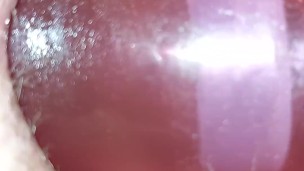 Close up view inserting and pulling out my xxl tunnel plug